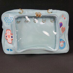 👜 Lovely Lota Ita Bag – Light Blue Backpack with Window – Kawaii Anime Style